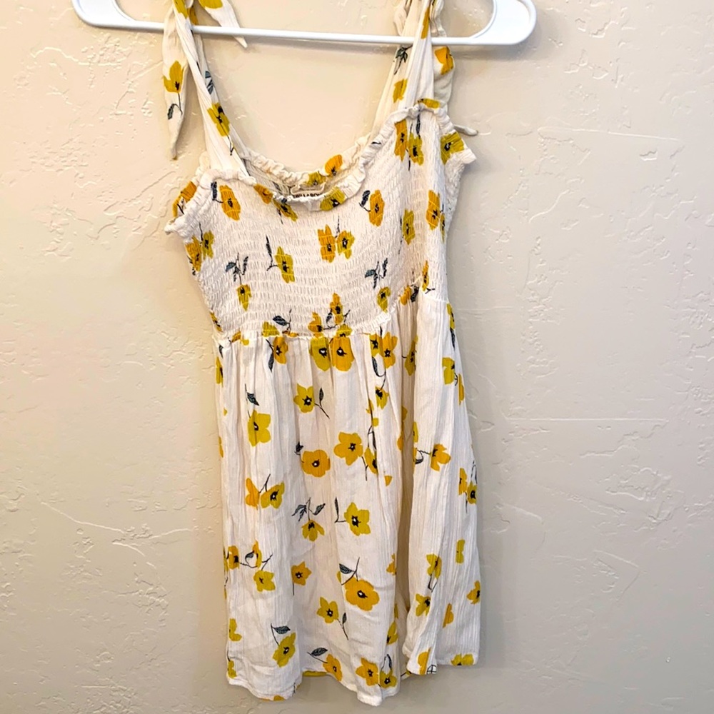 White Billabong Romper with Yellow Flowers